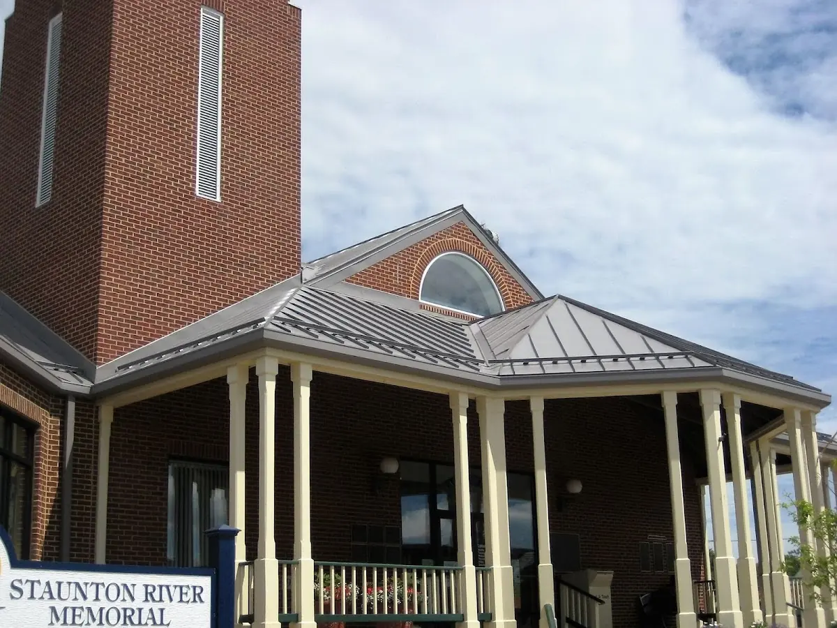 Skilled roofing craftsmen working on a residential roof in Springfield Station